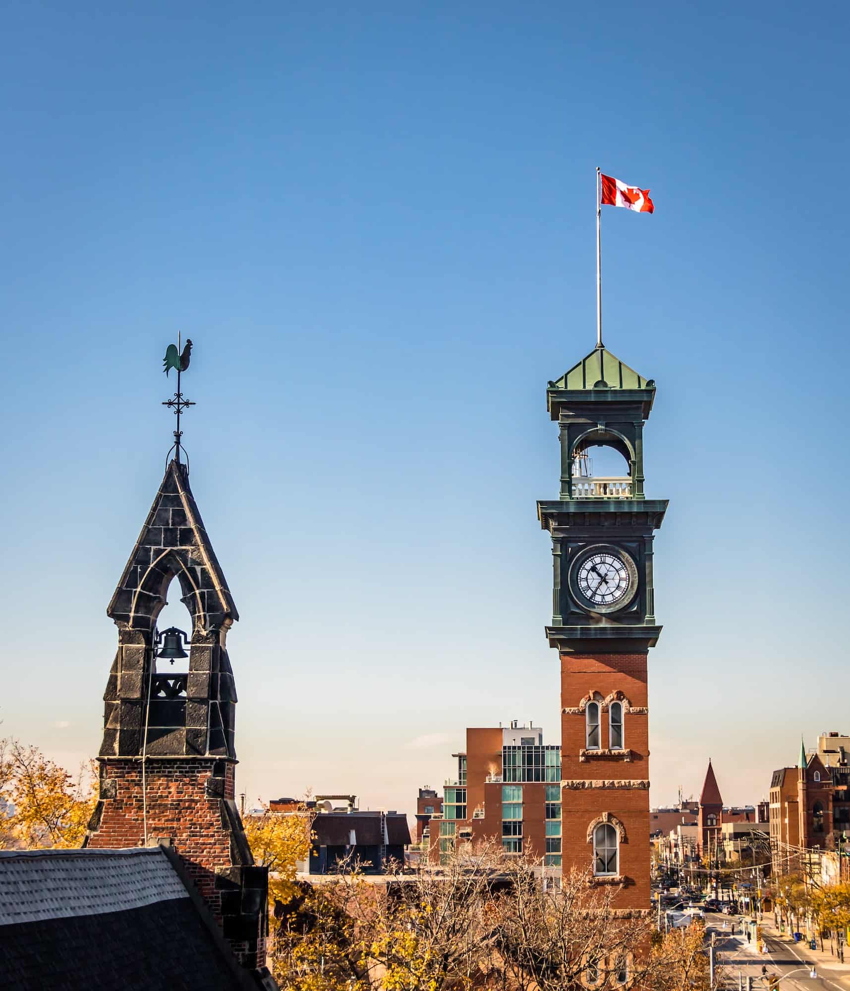 Church and Clocktower with Canadian Flag - Toronto, Ontario, Canada